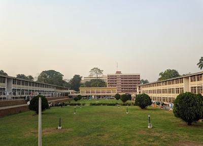 The inside of the Independence Hall, KNUST showing some rooms, the trees and green grass