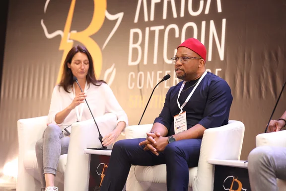Jude Ogene addressing a crowd at the Africa Bitcoin Conference at the Kempinski Hotel, Accra.