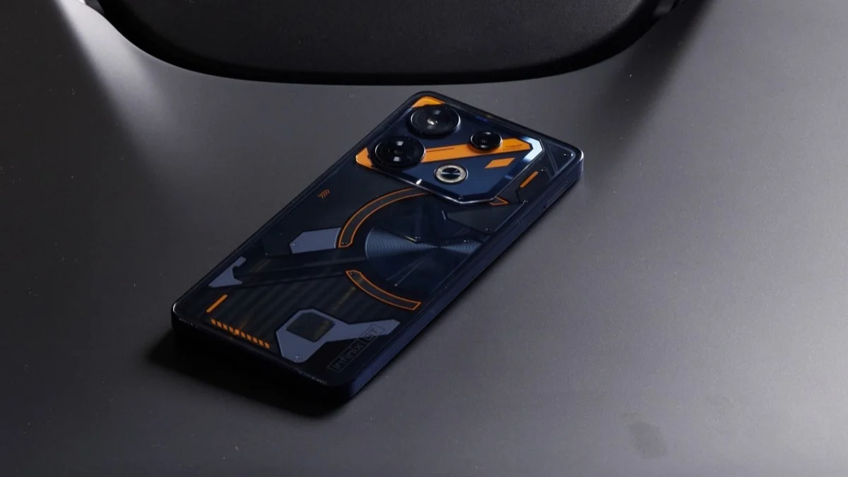 Infinix GT 10 Pro in black placed on a table